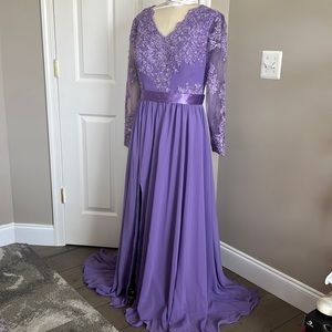 Custom lilac long dress with sheer sleeves and beautiful opening in back.